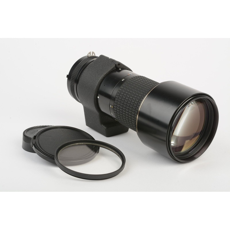 Nikon Nikkor*ED IF 300mm F4.5 AI-S Telephoto lens, collar, uv, caps, sharp