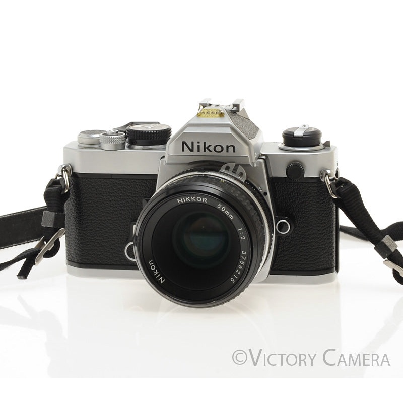 Nikon FM Chrome 35mm Film Camera w/ 50mm f2 Lens [EXC]