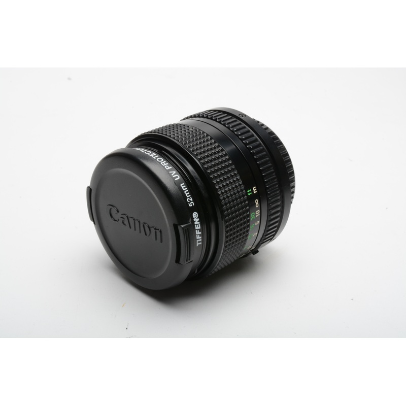 Canon new FD 50mm f1.4 prime lens, caps, UV filter, clean and sharp