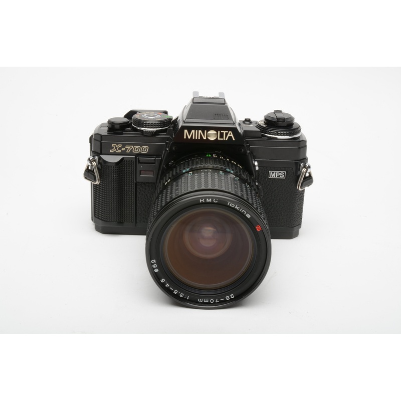 Minolta X700 35mm SLR w/28-70mm f3.5-4.5 zoom lens, UV, strap, new seals