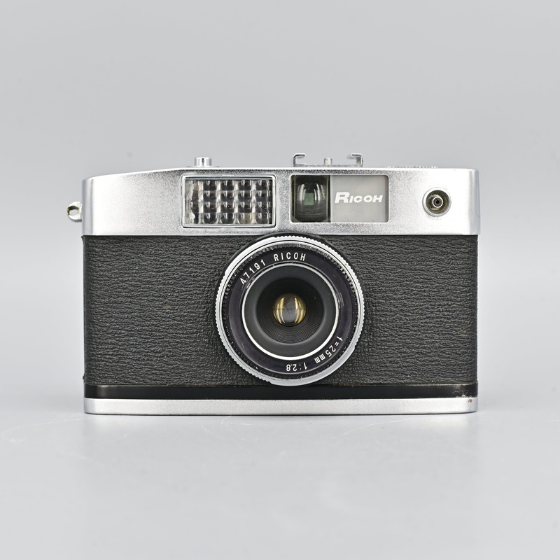 Ricoh Caddy.