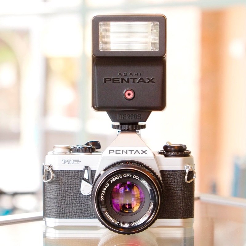 Pentax MG with SMC Pentax-M 50mm f2 lens and flash