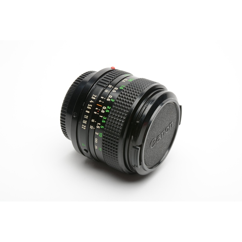Canon FD 28mm f2.8 wide angle lens, caps, nice and sharp